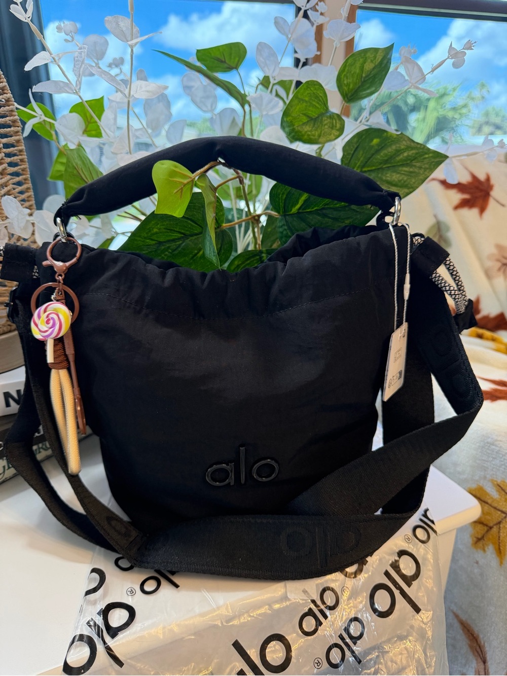 ALO Yoga Black Drawstring Mini Bucket Bag with Candy Charm - Picture 3 of 16